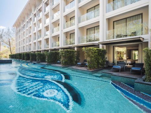 สระว่ายน้ำที่อยู่ใกล้ ๆ หรือใน Avani Plus Khao Lak Resort