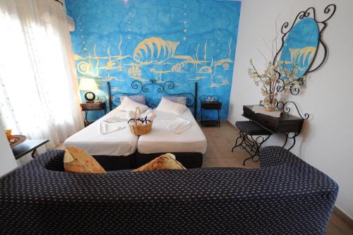 Postel nebo postele na pokoji v ubytování Thalassa Hotel