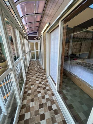 Ένα ή περισσότερα κρεβάτια σε δωμάτιο στο 別府ホーム