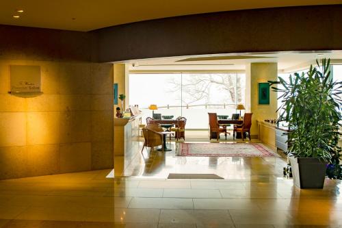 Posezení v ubytování Vignette Collection The Windsor Hotel TOYA by IHG