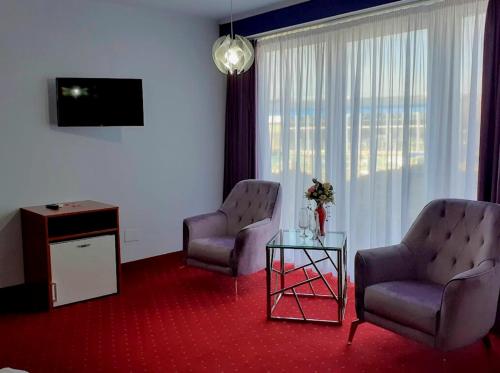 TV a/nebo společenská místnost v ubytování Hotel SunGarden Salin