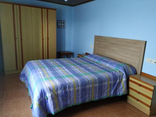 Säng eller sängar i ett rum på Casa Xancin