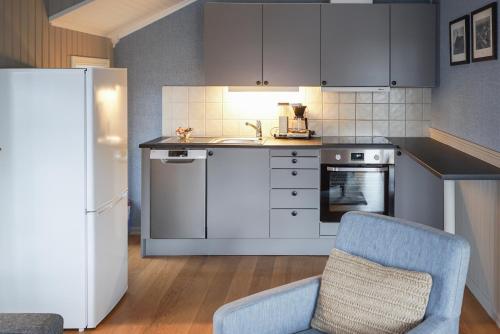 Cuisine ou kitchenette dans l'établissement Ona Havstuer - by Classic Norway Hotels