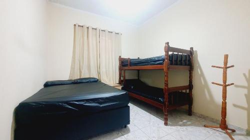 Двухъярусная кровать или двухъярусные кровати в номере Piscina, Churrasqueira, Wi-Fi, SmartTv, 4dorm, Comércios na porta
