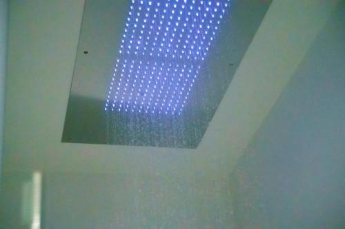 a blue light on the ceiling of a room at Hotel Luna in Vigonovo