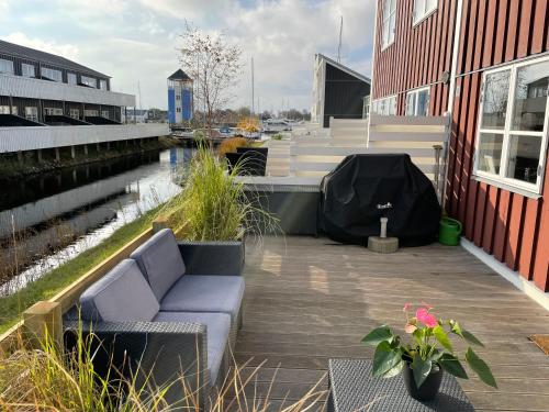 Posezení v ubytování Hyggelig sommerhus Øer Maritime ferieby Ebeltoft