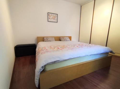 Posteľ alebo postele v izbe v ubytovaní Campanello Apartment