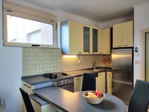 Kuchyňa alebo kuchynka v ubytovaní Campanello Apartment