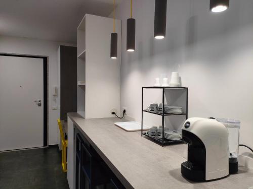 A kitchen or kitchenette at Central Rooms Matera