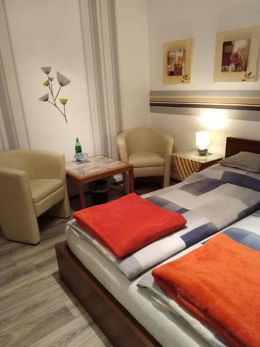 Hotel Garni "Adria"にあるベッド