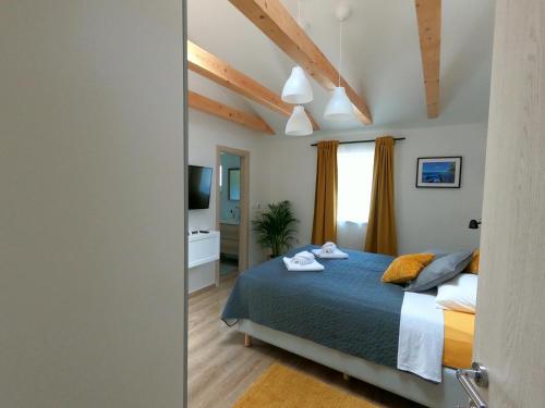 Postel nebo postele na pokoji v ubytování Gavan Room