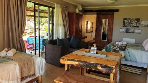 Cama o camas de una habitación en Thaba Lapeng Mountain Escape