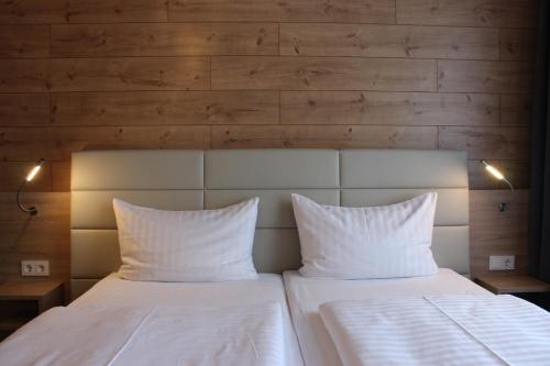 Кровать или кровати в номере Hotel Sankt Georg