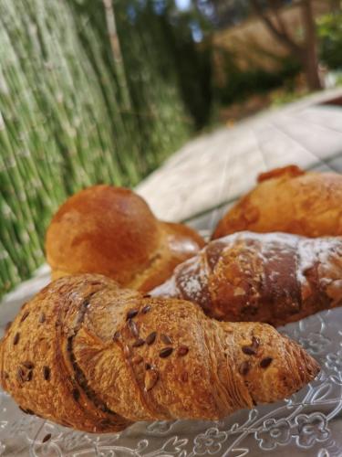 a group of pastries sitting on a tray at Palazzo Maresgallo Suites & SPA in Lecce