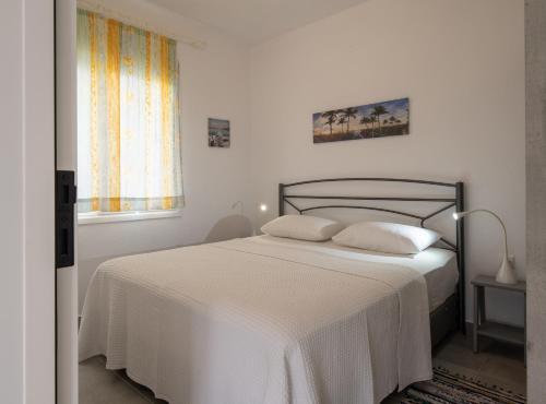 Postel nebo postele na pokoji v ubytování CN Studio-Apartment