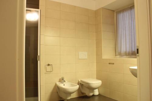 Koupelna v ubytování Trentino Apartments - Il Gufo Vacanze