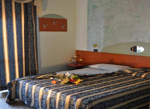 Postel nebo postele na pokoji v ubytování Hotel Nascente