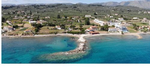 an aerial view of a small island in the ocean at Ianthi Beach Villa in Kypseli