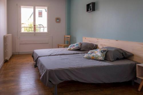Postel nebo postele na pokoji v ubytování La cahute, Gîte avec jardin pour 15 personnes