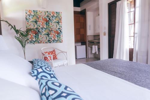 Hotel Tibau Lagoaにあるベッド