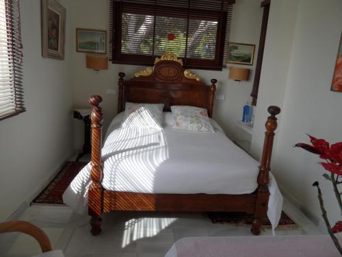 A bed or beds in a room at villa Getty