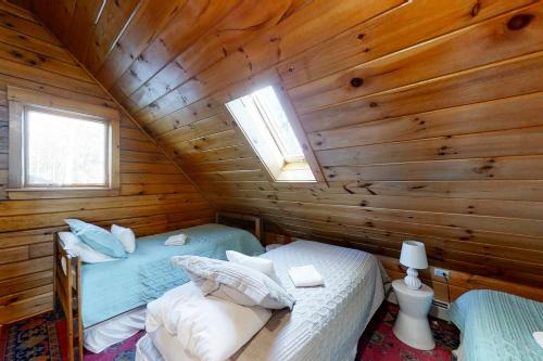 Postel nebo postele na pokoji v ubytování Beaver Run Cabin