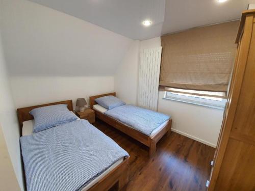 Ένα ή περισσότερα κρεβάτια σε δωμάτιο στο Monteurwohnung - Handwerkerwohnung