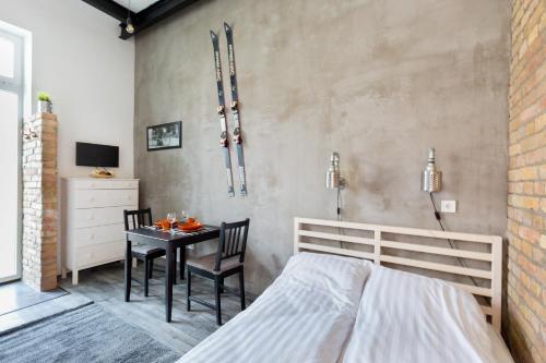 Posteľ alebo postele v izbe v ubytovaní K10 A Kazinczy Apartment