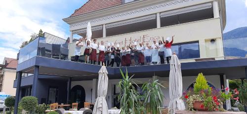a group of people standing on top of a building at Hotel Comfort Erica Dolomiti Val d'Adige in Salorno sulla Strada del Vino