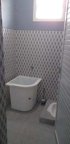 Ένα μπάνιο στο Pintu Waluh Homestay