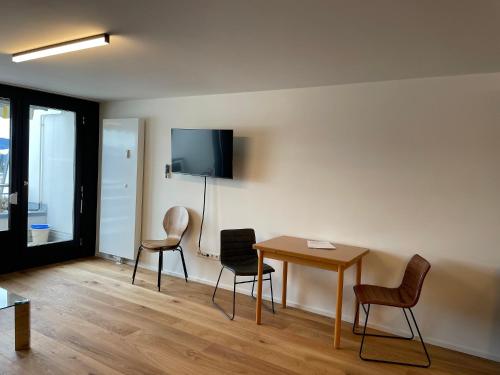 TV a/nebo společenská místnost v ubytování Appartement Rosenalm Scheidegg 115