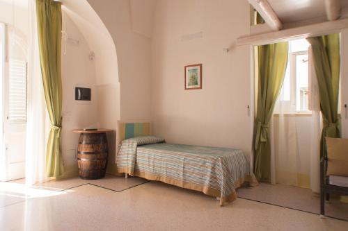 Katil atau katil-katil dalam bilik di Masseria Bufolaria