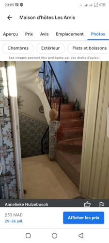 a picture of a staircase with a person walking up the stairs at La maison des amis in Taroudant