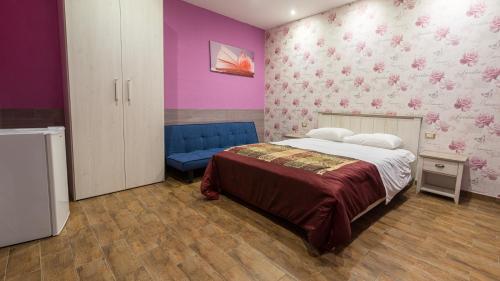 Postel nebo postele na pokoji v ubytování Dimora Delle Grotte