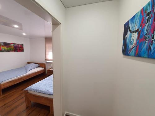Ένα ή περισσότερα κρεβάτια σε δωμάτιο στο Monteurwohnung - Handwerkerwohnung