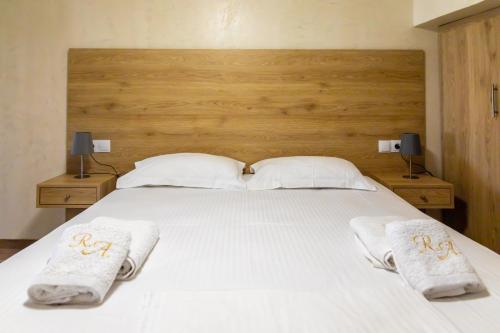 Postel nebo postele na pokoji v ubytování Remezzo Luxury Apartments
