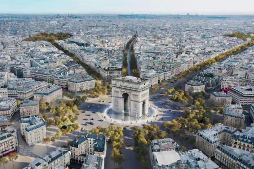 an aerial view of a city with a statue at 07 - Chambre proche Paris et Transports avec TV WIFI in Saint-Denis