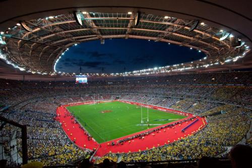 uma vista aérea de um estádio de futebol à noite em 07 - Chambre proche Paris et Transports avec TV WIFI em Saint-Denis