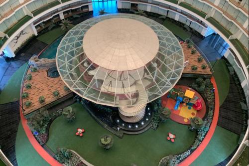 an overhead view of a round building with a playground at 7 star Weekend studio at Rajhans Belliza by Global Hospitality in Surat