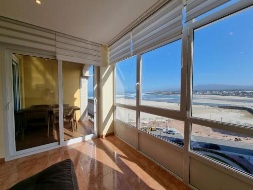 Afbeelding uit fotogalerij van Dúplex en 1ª línea de playa in Foz