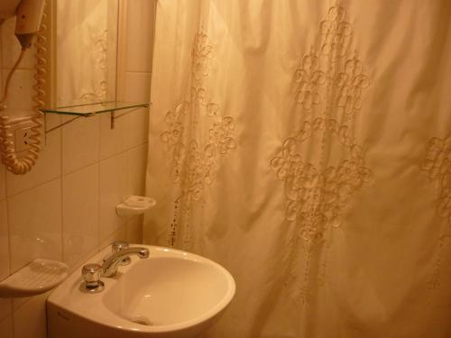 A bathroom at Apart Hotel Alem