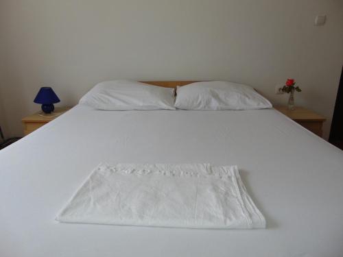 Ένα ή περισσότερα κρεβάτια σε δωμάτιο στο Apartment Mia