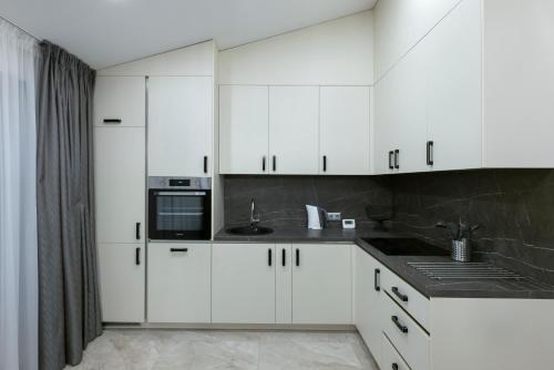 A cozinha ou cozinha compacta de Godos apartamentai