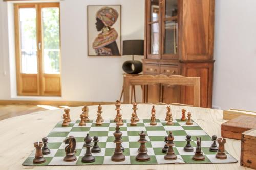 a chess set on a table in a room at CASA AZUL in Monchite