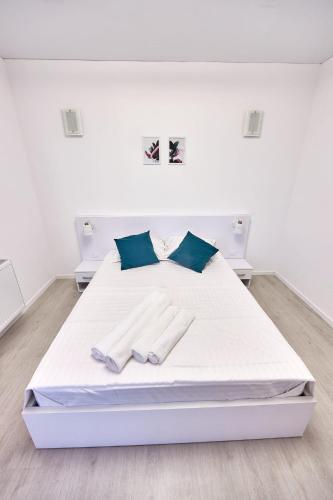 Ana Apartament tesisinde bir odada yatak veya yataklar