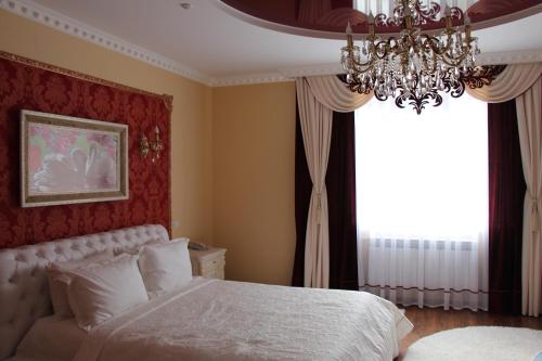 Una cama o camas en una habitación de Sobkoff