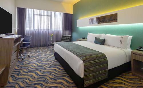 Katil atau katil-katil dalam bilik di Sonesta Hotel Arequipa