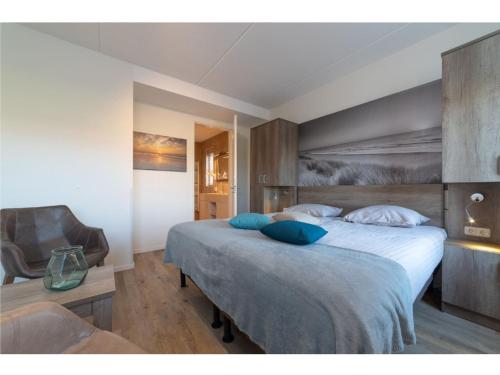 Ένα ή περισσότερα κρεβάτια σε δωμάτιο στο Holiday Home in Colijnsplaat by the Sea