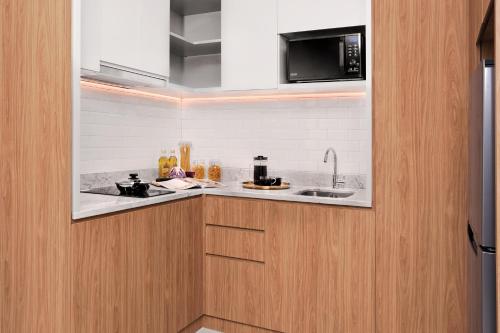 Kuchyň nebo kuchyňský kout v ubytování Citadines Sudirman Jakarta