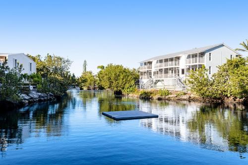 a river with a mat in the middle of it at Kawama Yacht Club A4 in Key Largo
